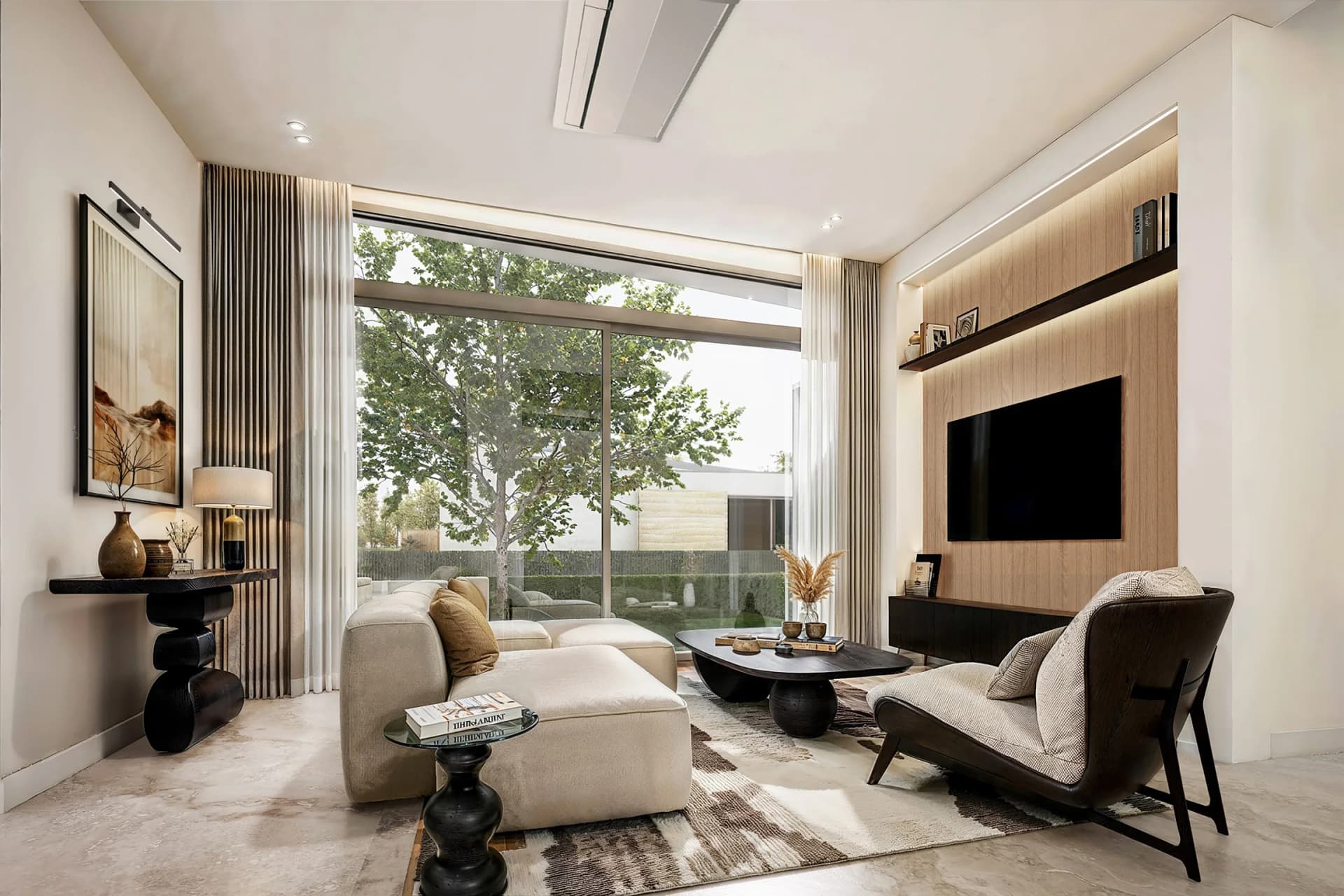 Double-height living room opening onto the garden