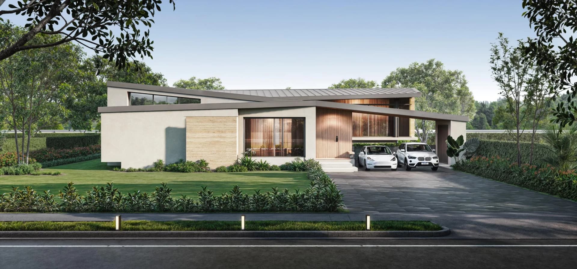 Villa tipo B vista desde la calle: revestimiento de piedra, celosía de madera y cochera para dos coches